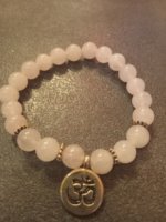 bracciale quarzo rosa con Ohm