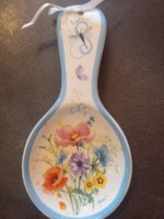 poggiamestolo con decori floreali